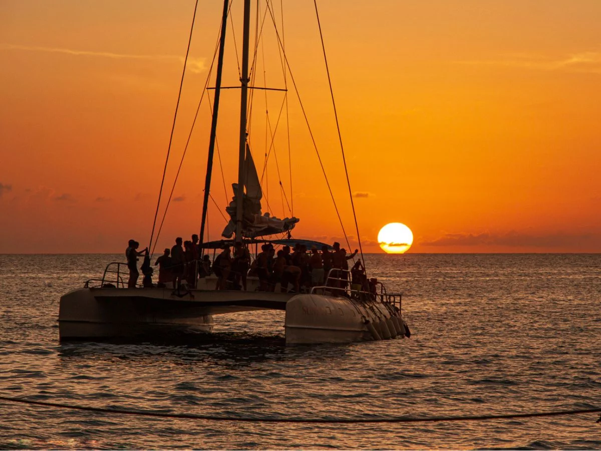 Catamaran Sunset Cruise A catamaran on a sunset cruise