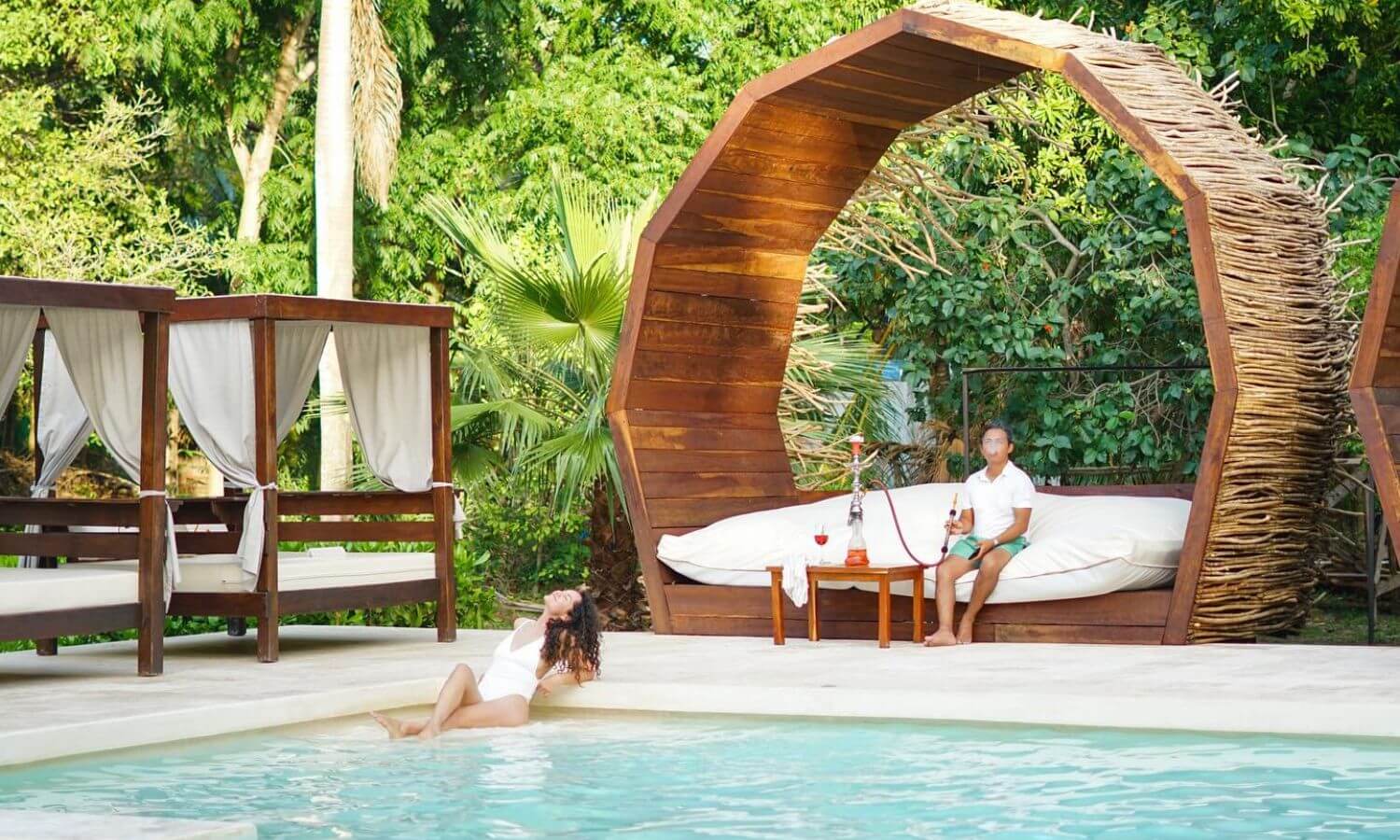 Relaxing by the pool at ZaZa Beach Club Isla Mujeres