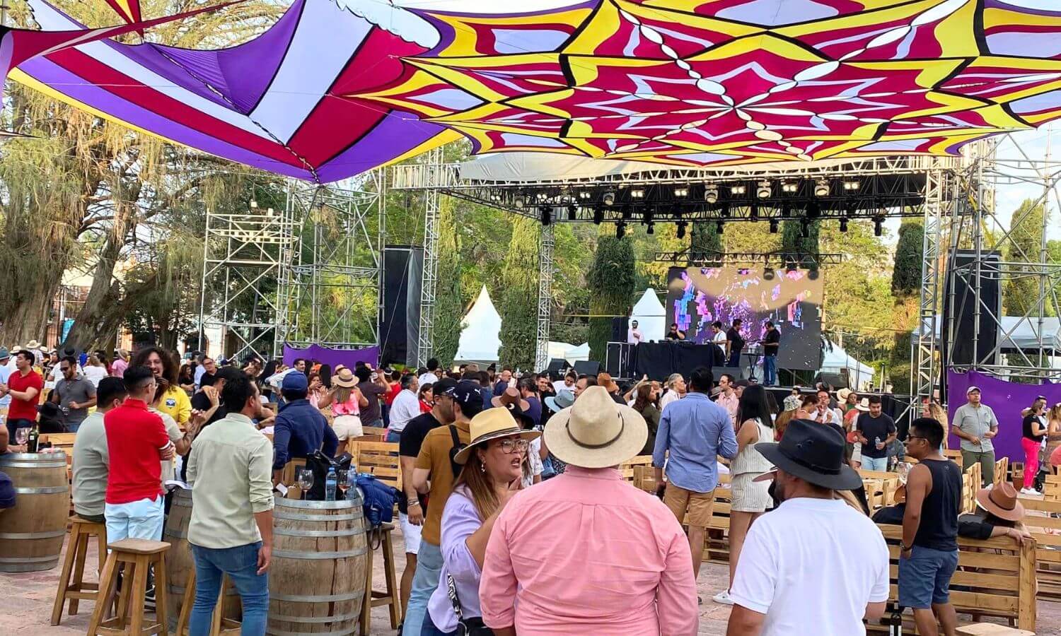 A crowd listening to a live band at the National Cheese and Wine Festival in Tequisquiapan
