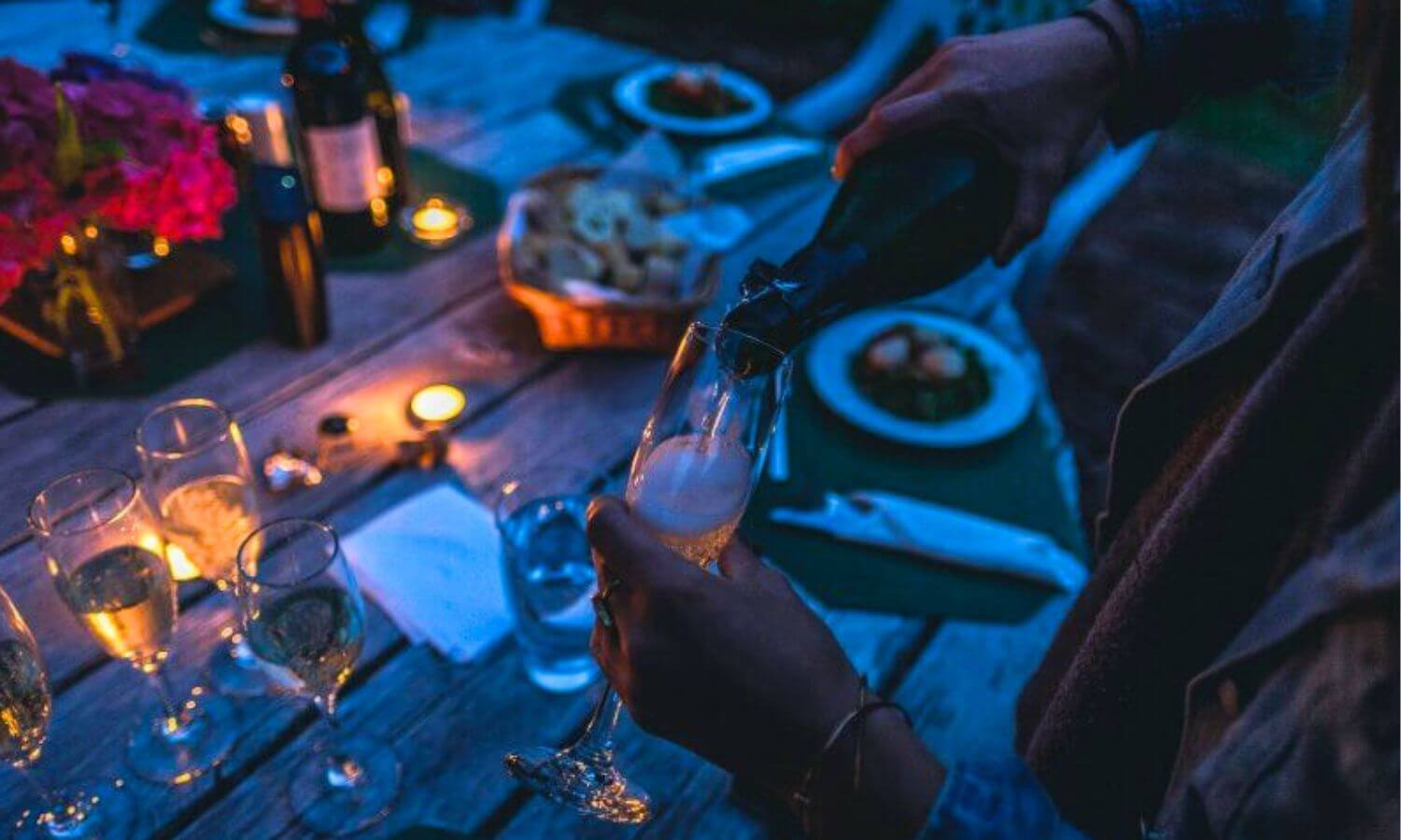 A table full of wines and food at the Valle Food and Wine Festival in Valle de Guadalupe