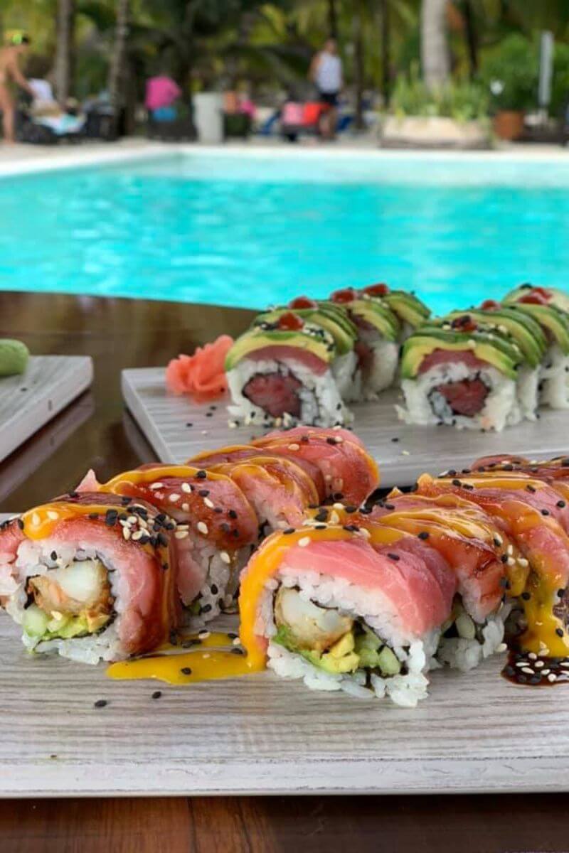 Sushi rolls in front of the pool at Buccanos Beach Club.