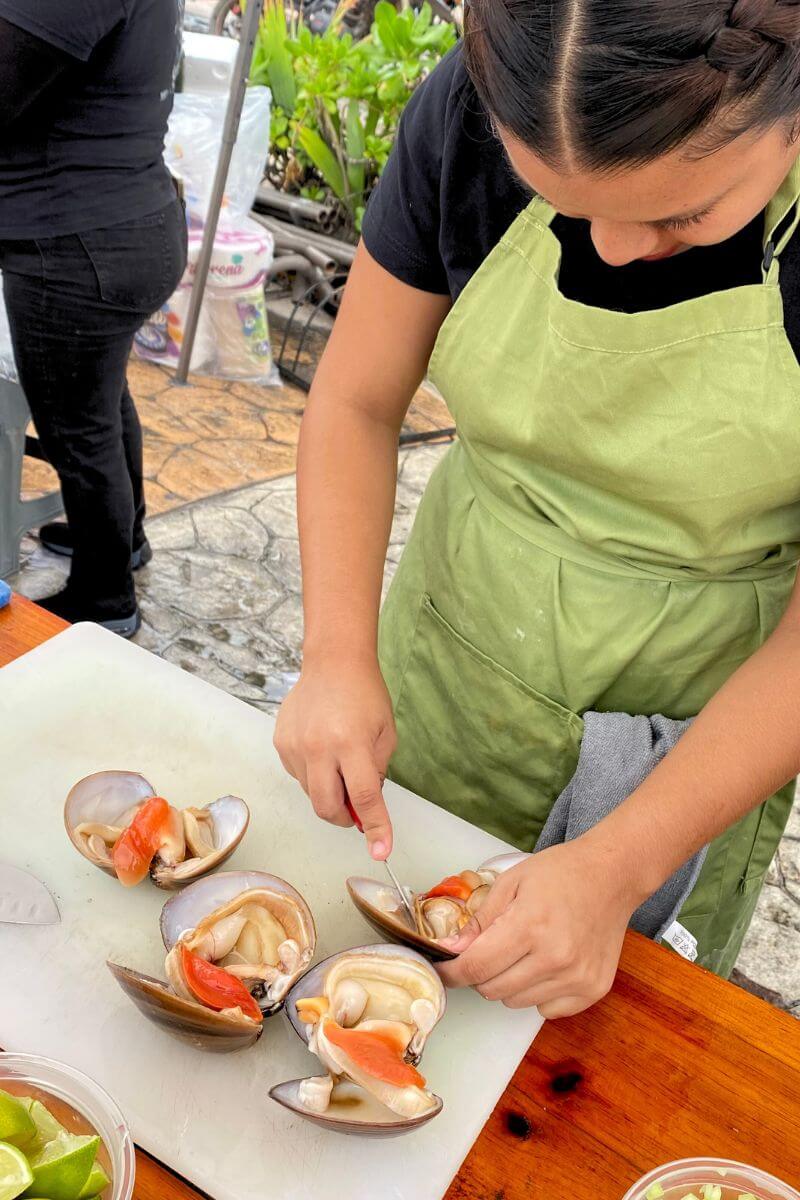 Chocolate Clams being prepared by staff from Mayday Puerto Morelos