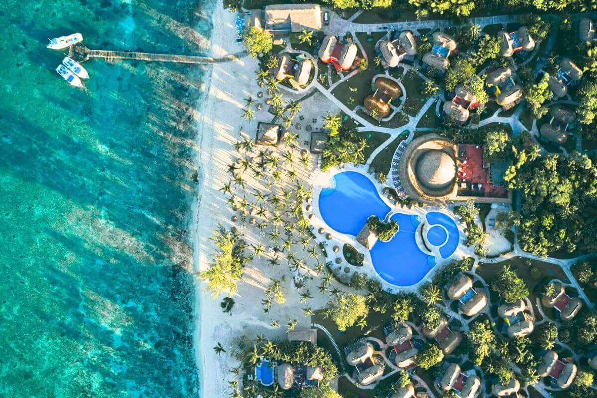A drone shot looking down at the complex and pool of the Iberostar, Cozumel.
