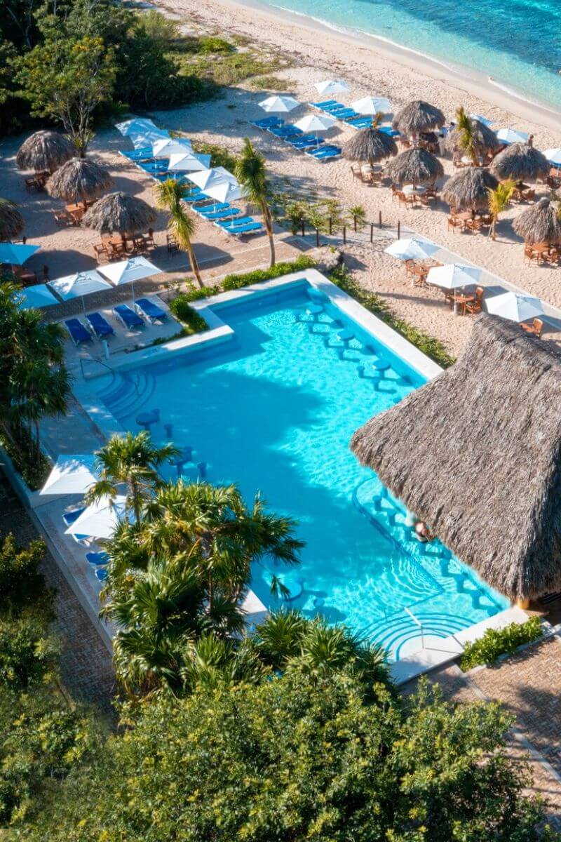 Looking over the pool, beach and ocean at Mr Sanchos Cozumel Beach Club. Best all-inclusive beaches in Cozumel.