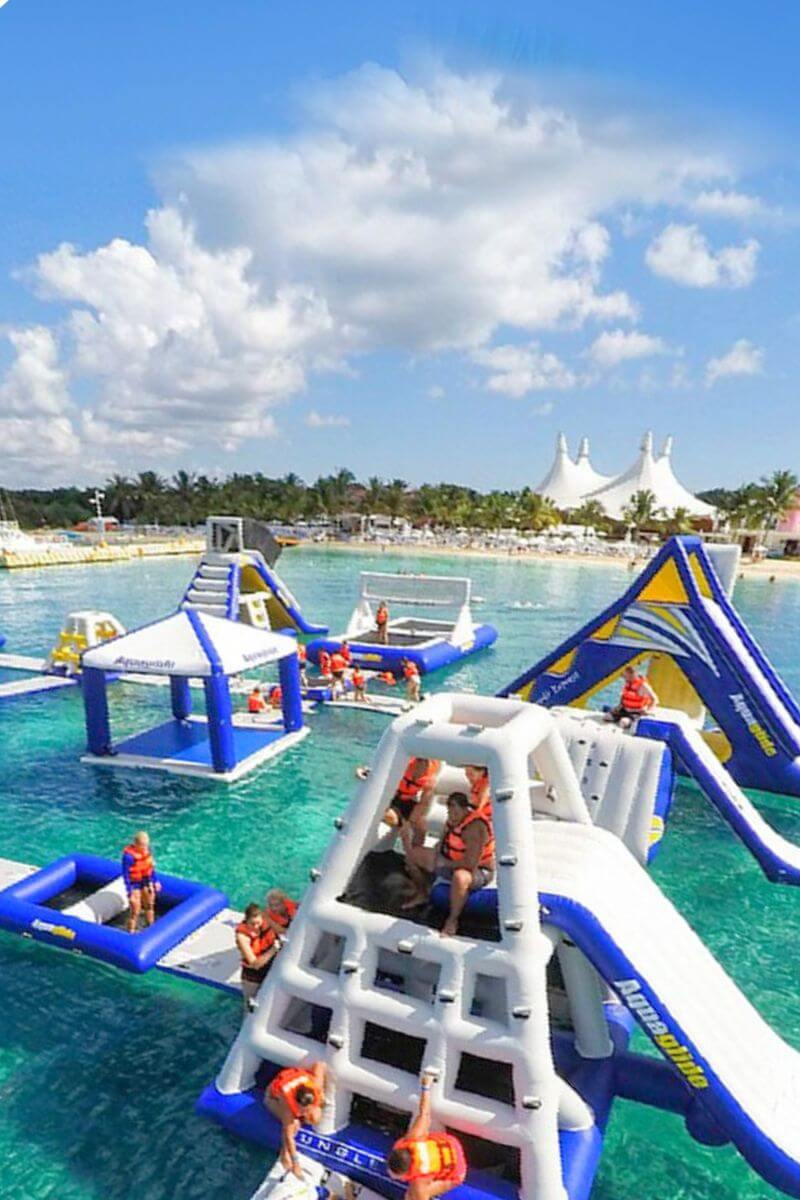 The slides and obstacle course in the ocean at Playa Mia Beach Club.