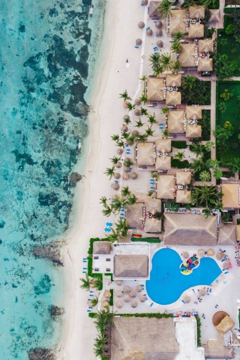 A drone shot looking down on the Sunscape Sabor Cozumel Resort.