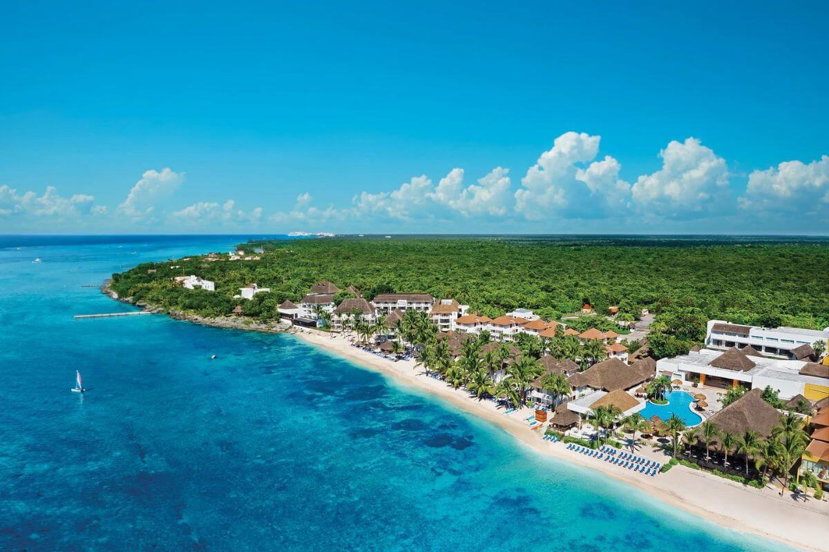 Sunscape Sabor Resort Cozumel taken from a drone over the ocean.