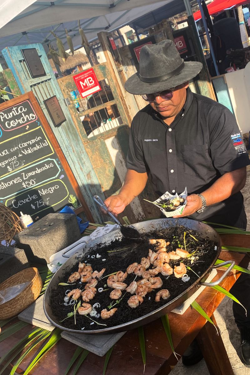 The fantastic black paella being served at the Mexican Caribbean Food Festival