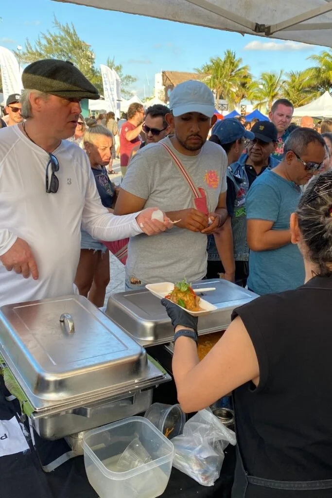 Festival Gastronomico Del Caribe - The 3Rd Annual Mexican Caribbean Gastronomic Festival In Puerto Morelos 26 People being served at one of the stands at the mexican caribbean gastronomic festival