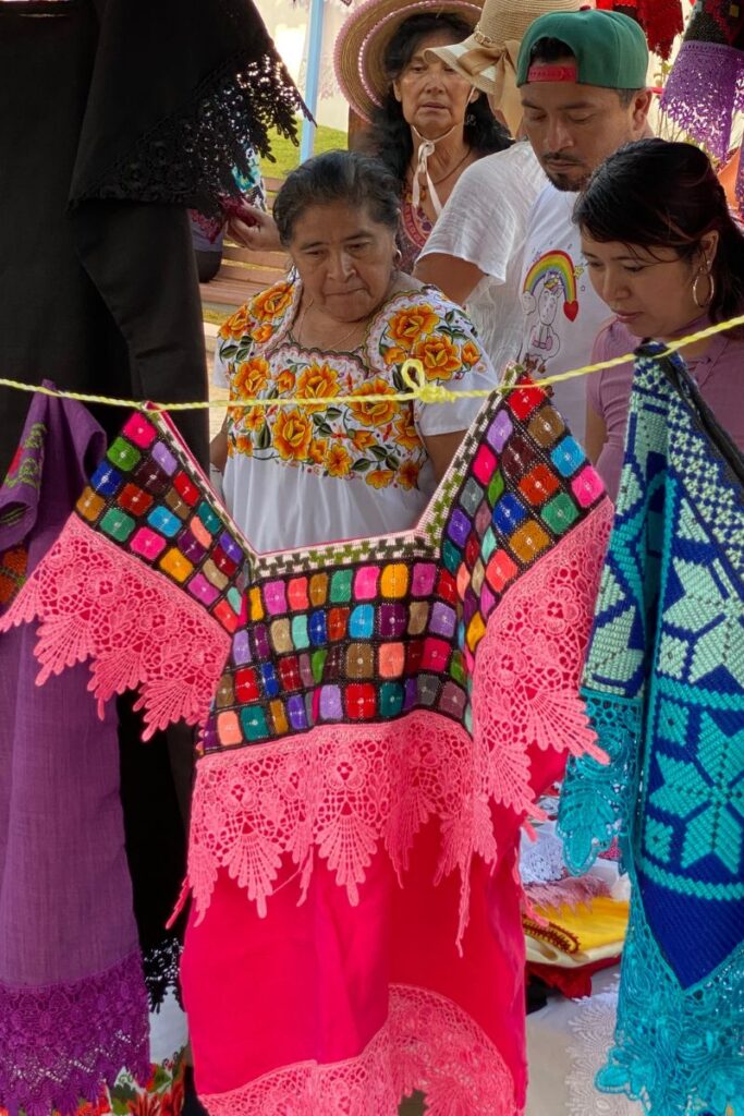 A beautifully decorated traditional Yucatan top being sold on a market stand at the Food festival in Puerto Morelos.