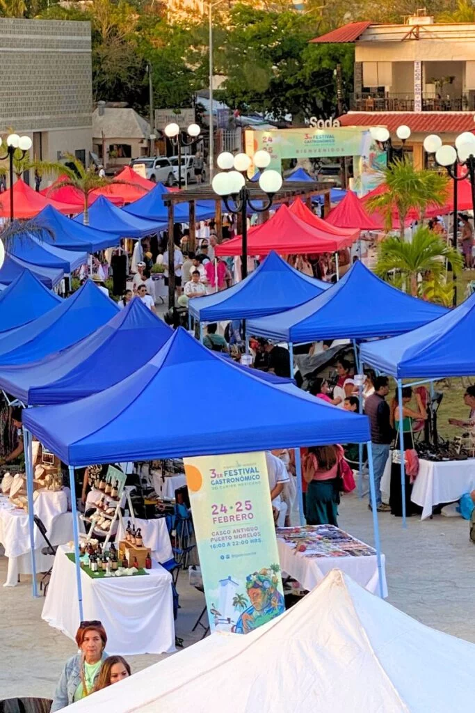 Festival Gastronomico Del Caribe - The 3Rd Annual Mexican Caribbean Gastronomic Festival In Puerto Morelos 1 Looking over the blue and red canopies of the market vendors at the mexican caribbean food festival in puerto morelos,