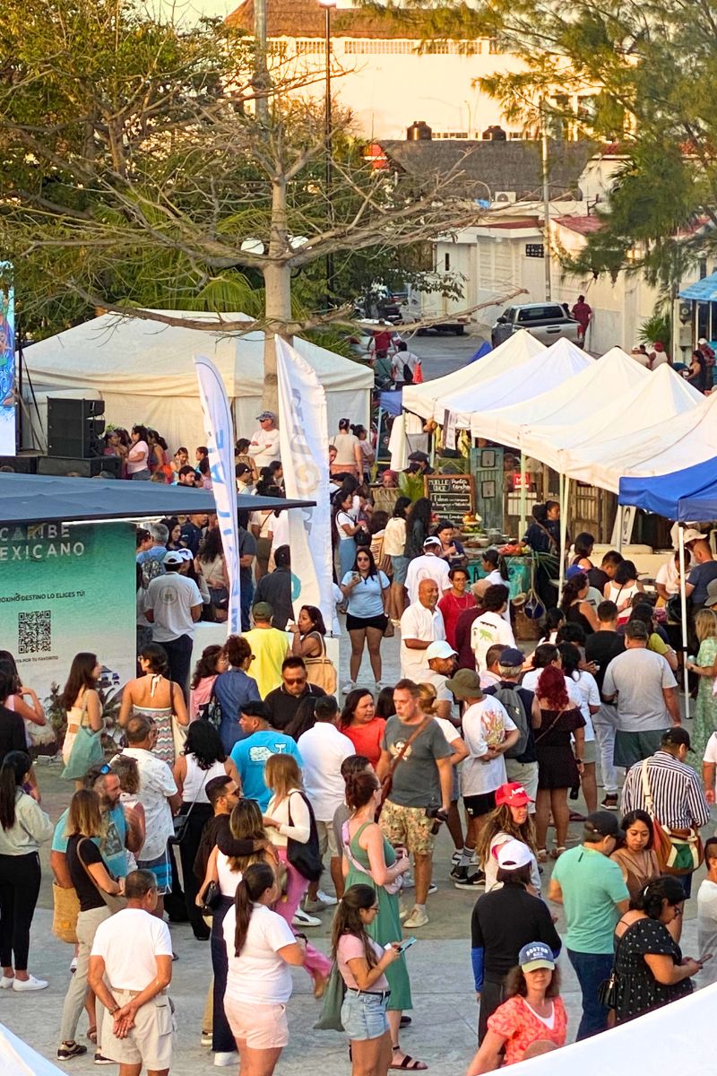 Looking across the crowds of people visiting the many vendors at the Mexican Caribbean Food Festival.