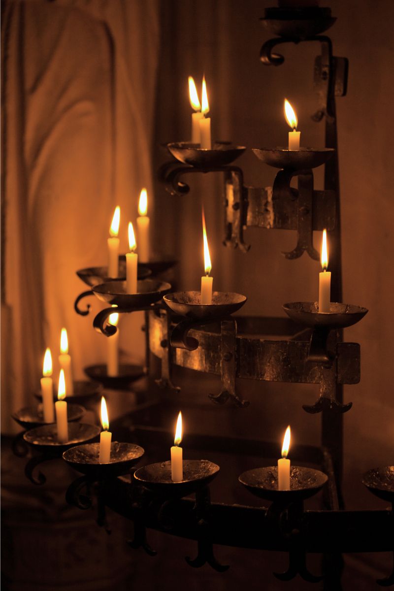 Candles in a church for Los Matines de las Tinieblas on Holy Wednesday. Part of the Easter Celebrations in Mexico.
