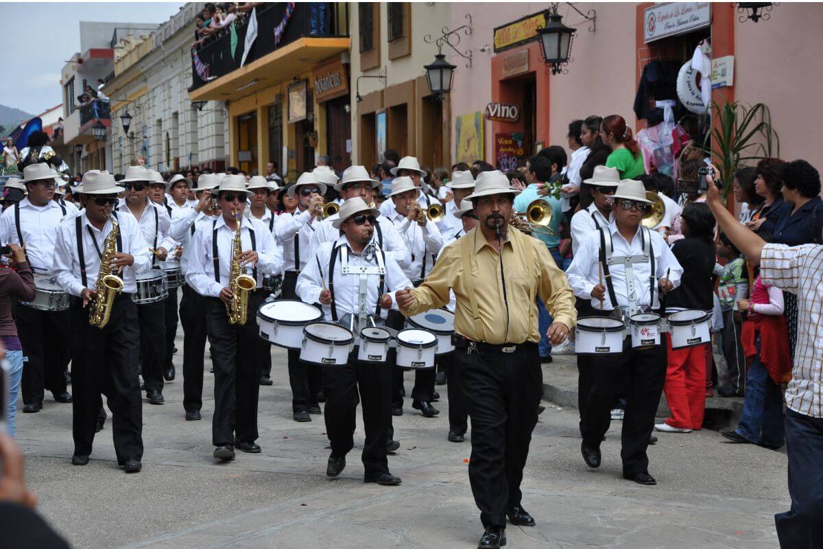 A Marching Band walking through the street for Easter in Mexico.