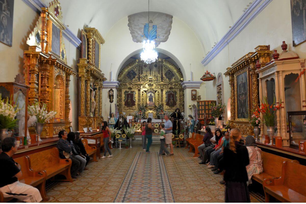 People in a church as part of the Visitation of 7 Chuches, at Easter in Mexico.