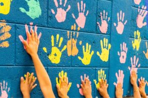 Home 5 What is el día del niño handprints on a wall