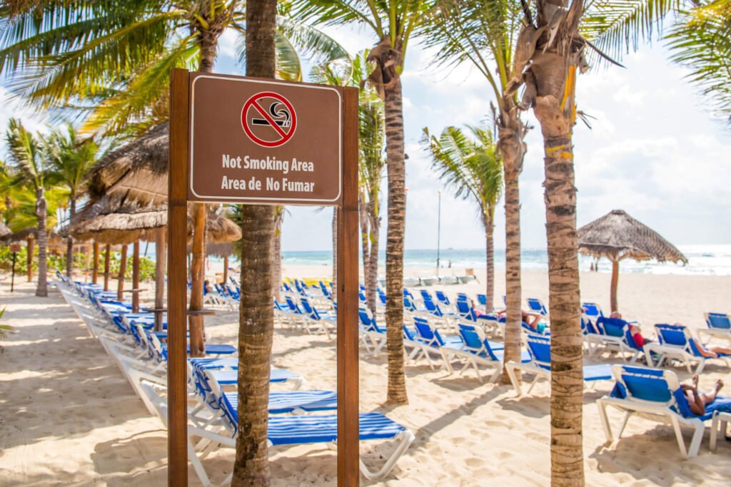 no smoking sign at a beach club