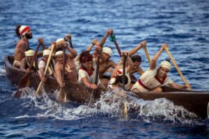 Home 6 Group of canoers paddling in the travesia sagrada maya from playa del carmen to cozumel