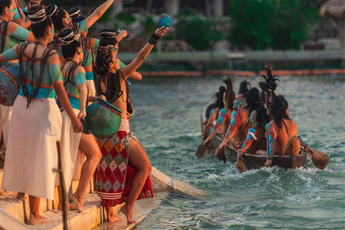 group of canoers paddling in the travesia sagrada maya leaving from xcaret