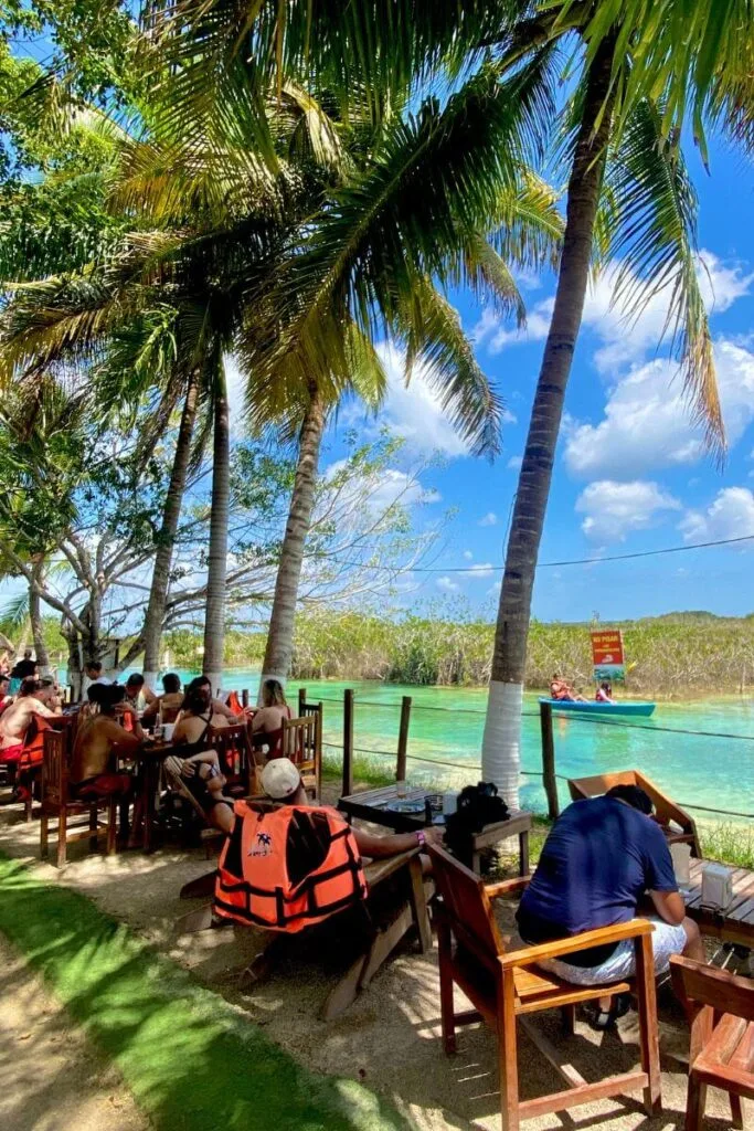 Floating Through Paradise: An Afternoon At Los Rapidos Bacalar 5 Seating areas under the coconut palms at los rapidos bacalar